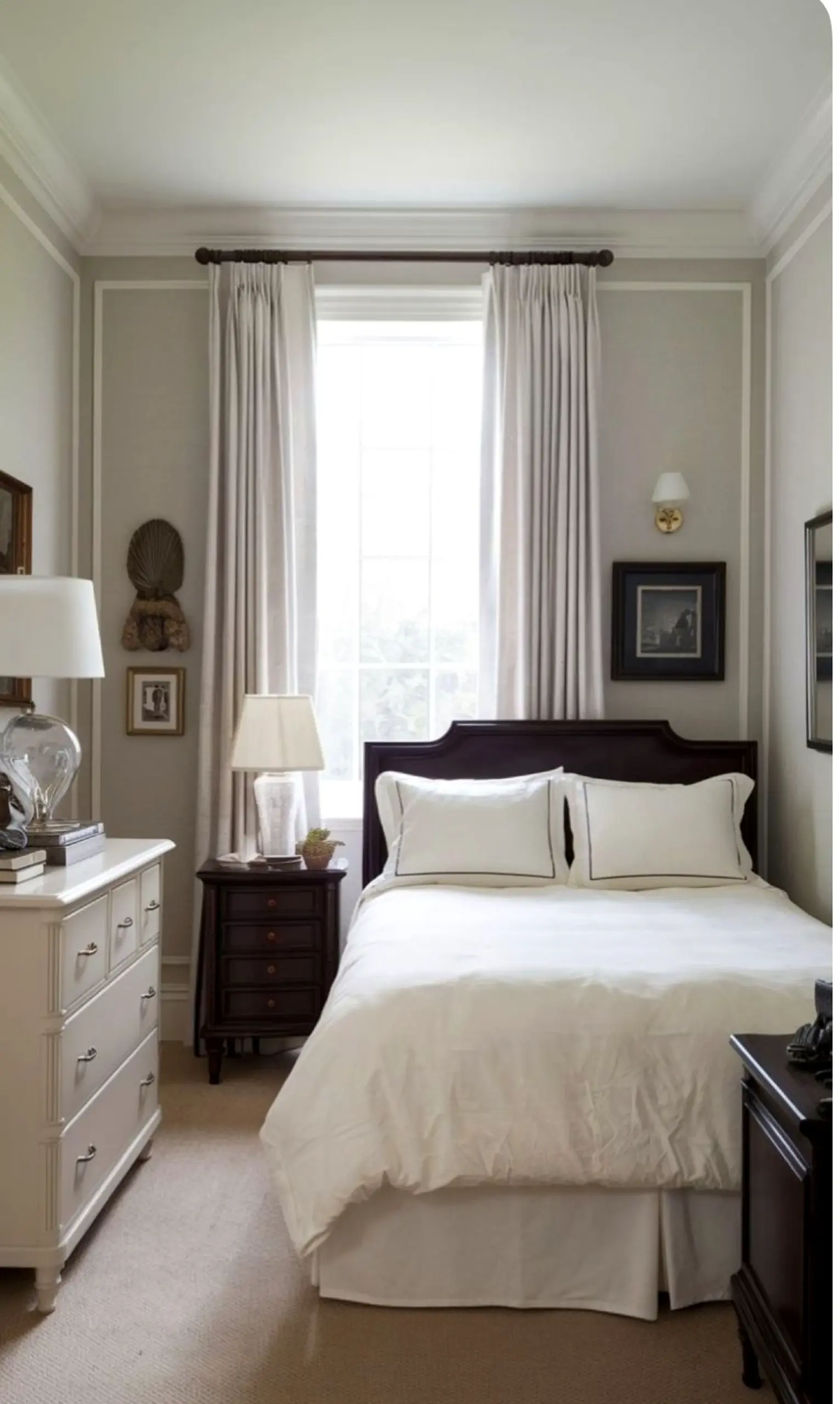 Sculptural decorative mirror frames the view with warmth, making the scene feel pleasantly composed.