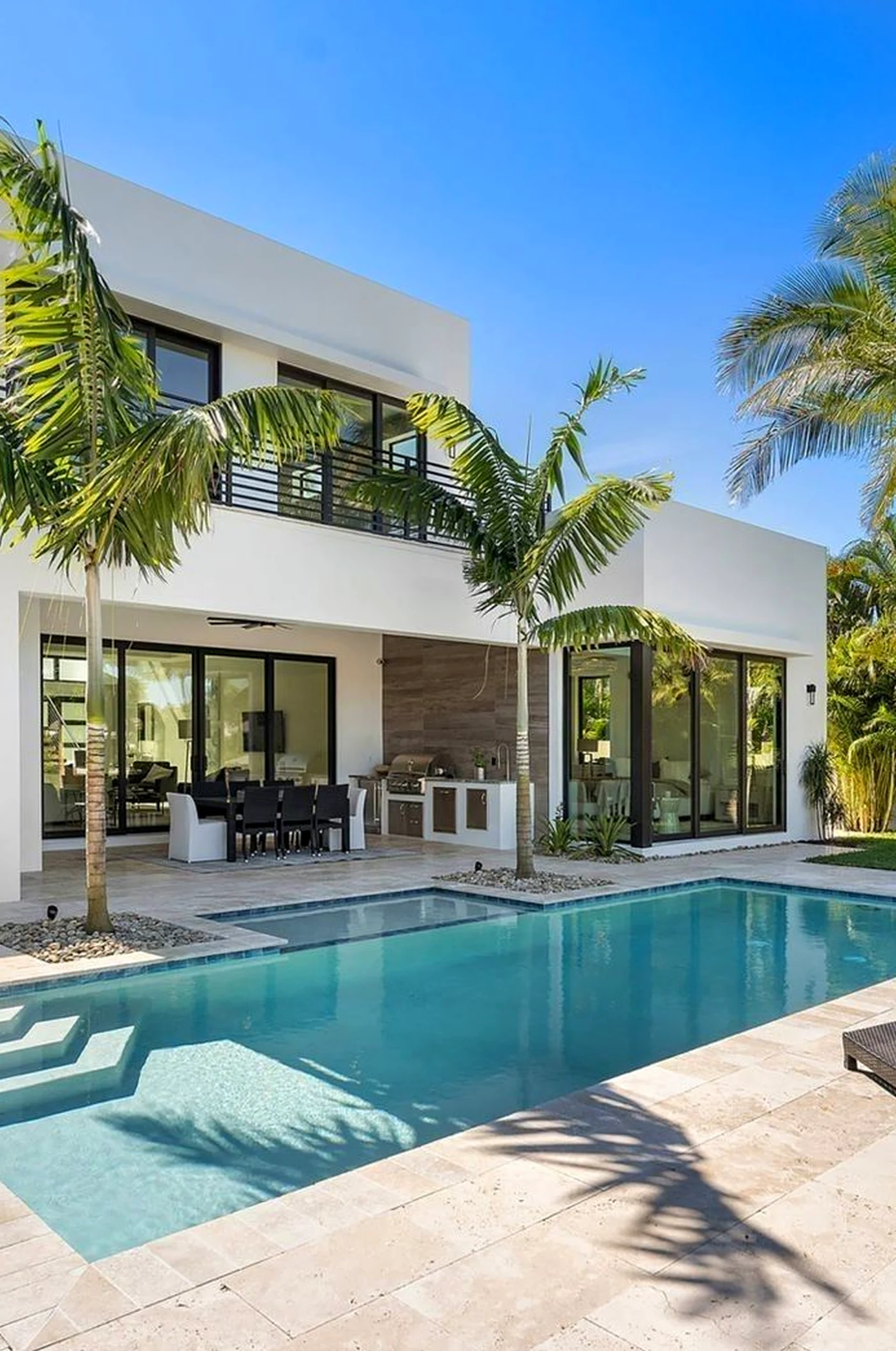 Simple balcony scene brings a useful note of personality, making the entry feel simple yet expressive.