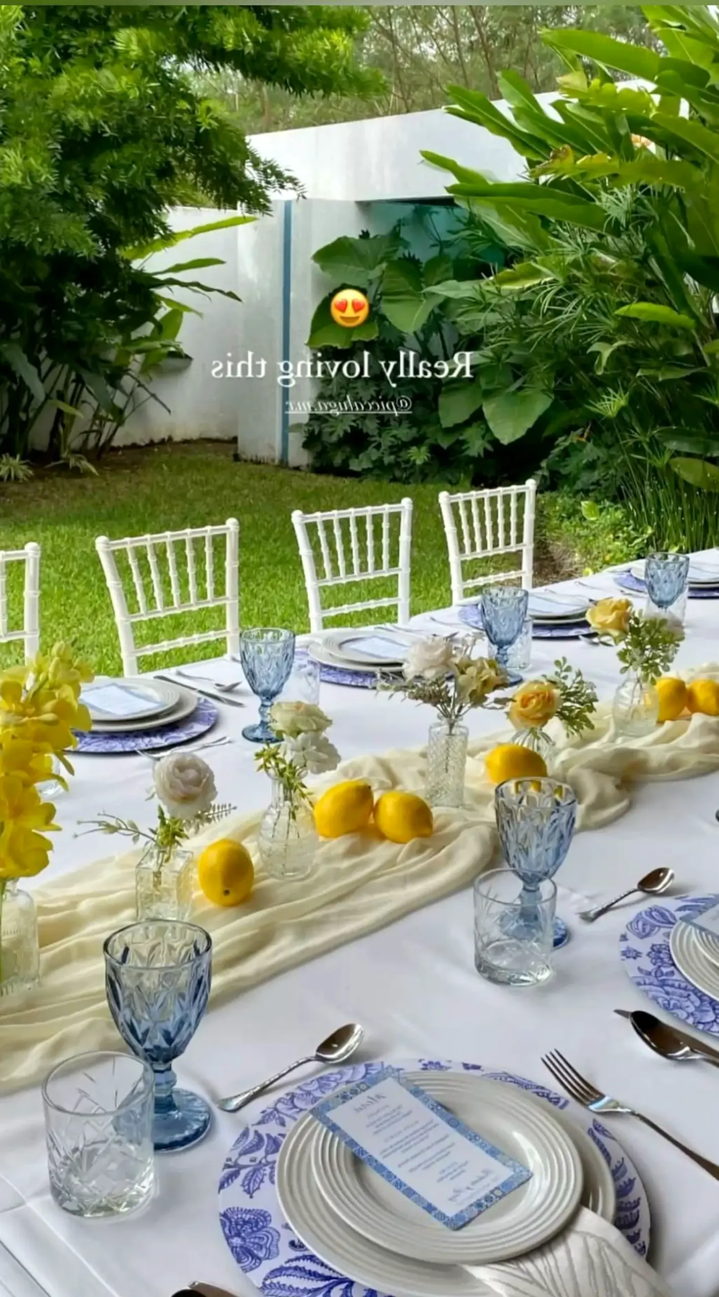 Elegant balcony scene draws attention to freshness while the garden edge stays soft at the edges.