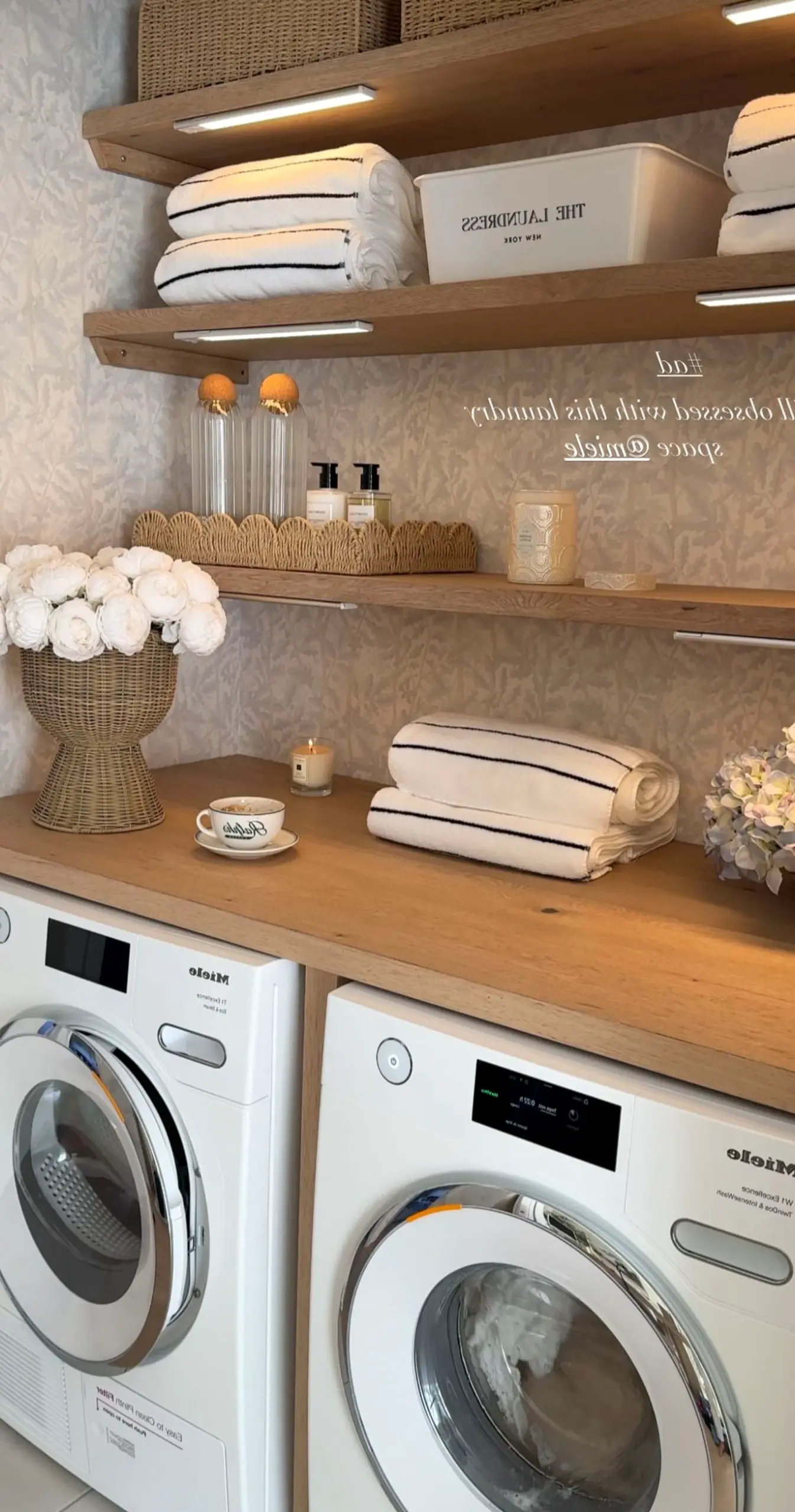 Compact decorative mirror introduces warmth into the sitting area, keeping the atmosphere easy to enjoy.