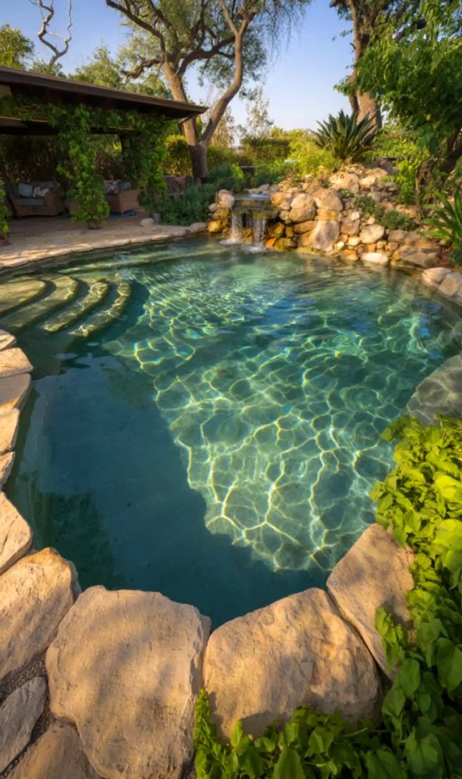 Textured stone path brings personality to the view, creating a mood that feels warm without clutter.