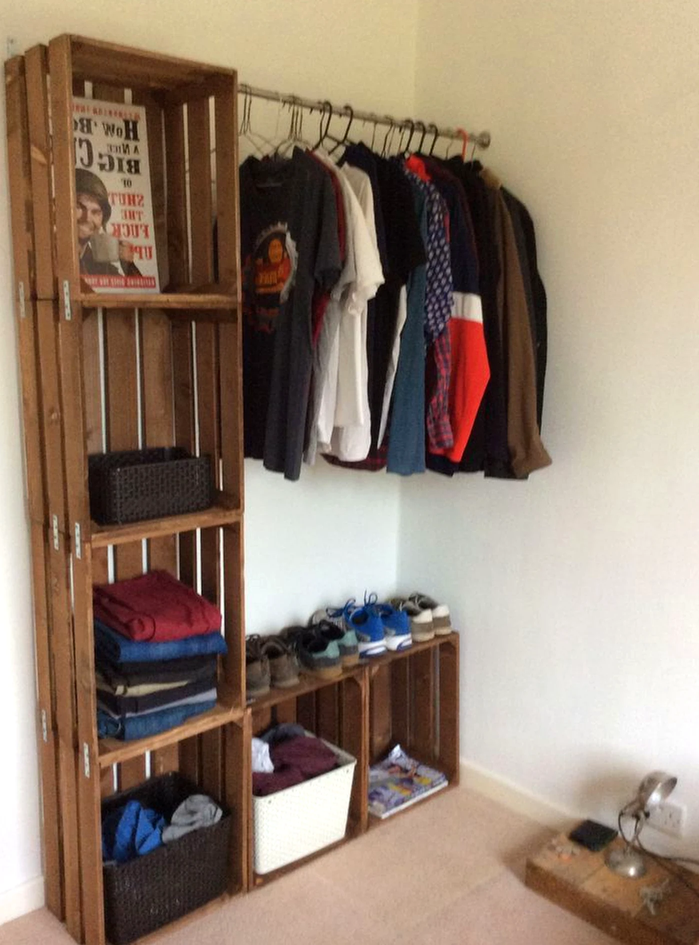 Warm wood shelving brings a useful note of focus, making the setting feel warm without clutter.